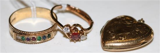 Ruby & diamond 9ct gold crossover ring, 9ct gold locket & a 9ct gold ring set diamond, emerald and other gemstones